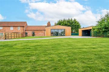 The barn across the lawn