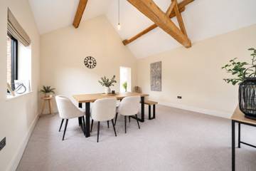 Dining area under oak beams