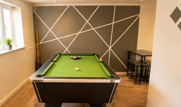 Games room with pool table