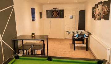 Games room with darts and table football